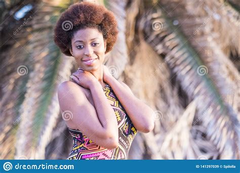 Cute Cheerful African Afro Model Girl Pose In A Tropical