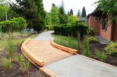 They filter rainwater runoff and provide a home to birds and butterflies. The Caring Bridge in the rain garden (because it WILL rain ...