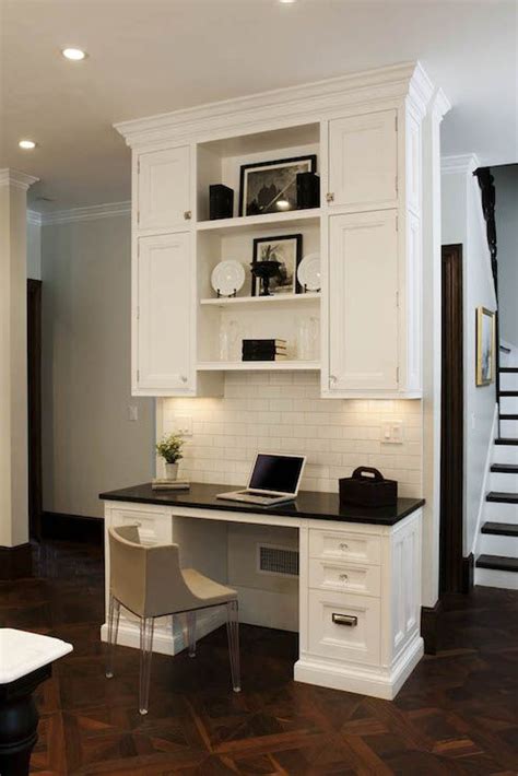 Desks built from strong materials are more stable. Fabulous kitchen with built-in desk featuring white ...