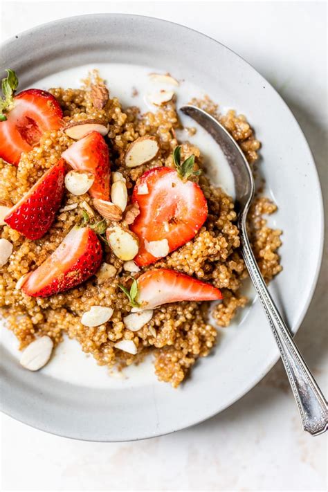 Here we topped the quinoa with chicken, cabbage, snow peas and carrots. Quinoa Breakfast Bowl - The Almond Eater