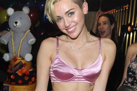 Clothes Are So Last Year Miley Cyrus Rocks Silk Lingerie As She