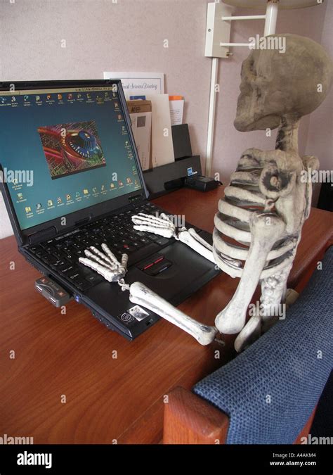 Bored Stiff Working Skeleton Stock Photo Alamy