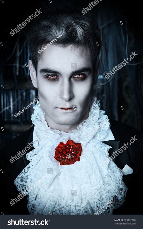 Handsome Vampire Man Wearing Elegant Tailcoat Stock Photo 329402228