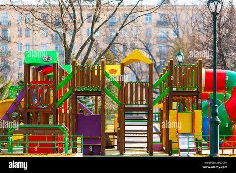 Childrens Playground As A Castle With Swings And Slides In The Park