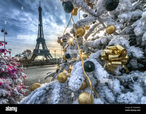 Eiffel Tower And Decorated Christmas Trees Paris France Stock Photo