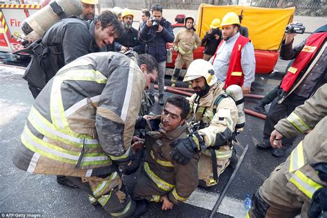 Firefighters Killed As Blazing Building Collapses In Iran