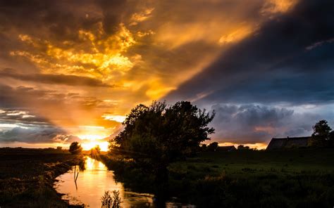 High Quality Wallpaper Of Sunset Image Of River Field Imagebankbiz