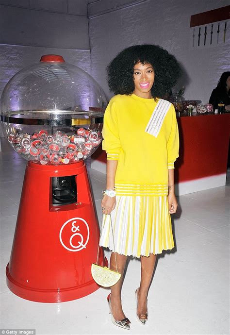 solange knowles shows off her legs in bright 80s style outfit in new york daily mail online