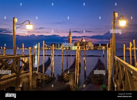 Colorful Sunrise At Venice With Blurred Gondolas And Street Lamps