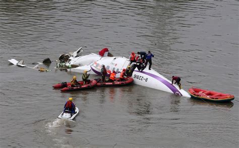 Image Rescuers Carry Out A Rescue Operation After A Transasia Airways