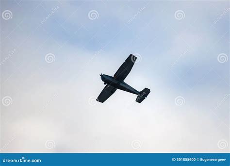 Light Aircraft Silhouette Is In Cloudy Sky Stock Photo Image Of