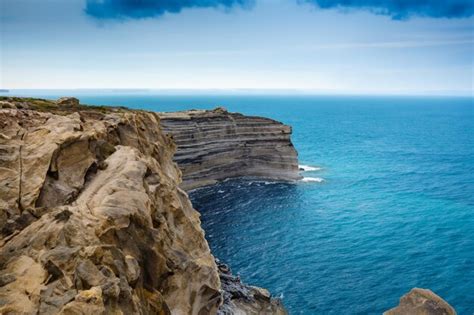 Premium Photo Breathtaking Coastal Cliffs Stunning Blue Sea Cliffs