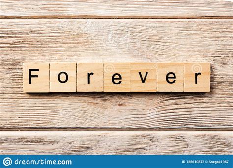 Forever Word Written On Wood Block. Forever Text On Table, Concept Stock Image - Image of ...