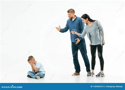 Angry Parents Scolding Their Son At Home Stock Photo Image Of Mother