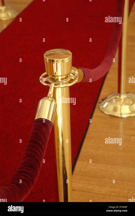 Brass Stanchion With Red Velvet Rope Hi Res Stock Photography And