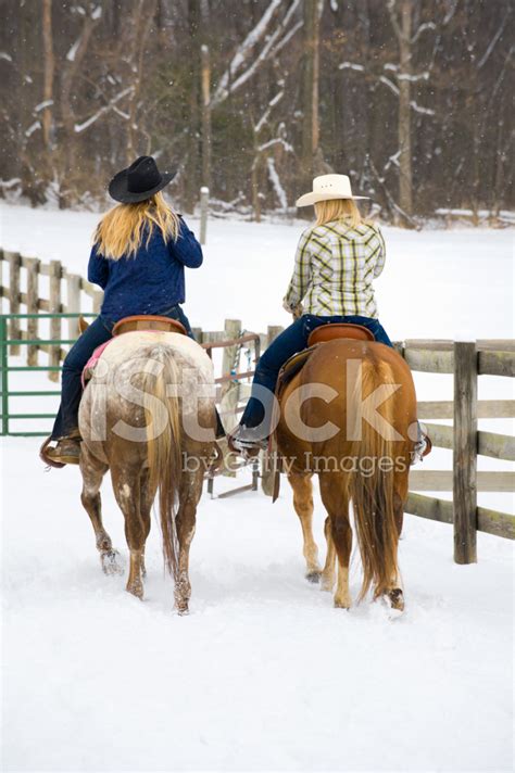 Two Women Horseback Riding In Winter Snow American Country Girl Stock