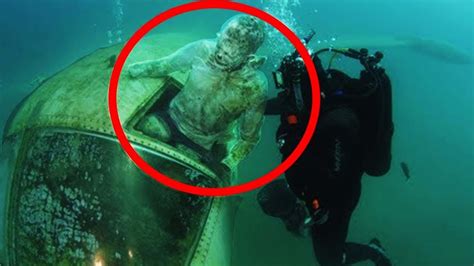 Diver Solves 75 Year Old Mystery After Body Trapped In Plane Grabs Hold