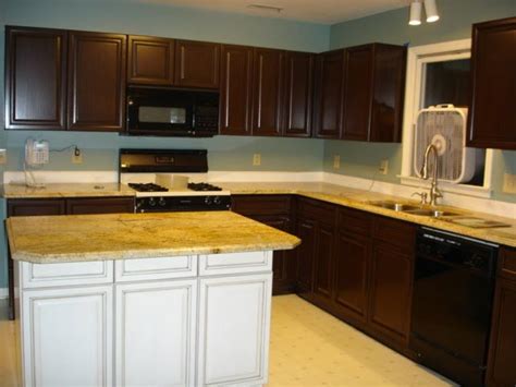Most people like to retain the wooden finish. Oak Cabinets Painted Brown With Glaze Grain Effect ...