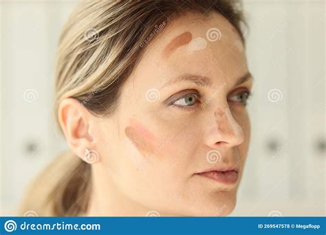 A Close Up On The Female Face Of A Tonal Cream Smear Stock Photo