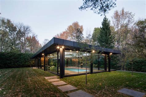 A Glass House Inspired Pavilion Houses An Indoor Swimming Pool
