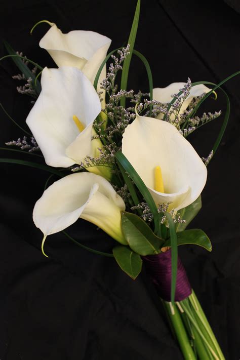 The Timeless Calla Lily With Lavender Mist And Lily Grass Calla Lily Wedding Flowers