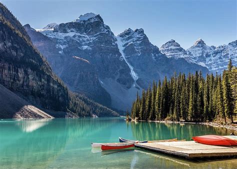 Moraine Lake Colorful Canoes Photograph By Pierre Leclerc Photography