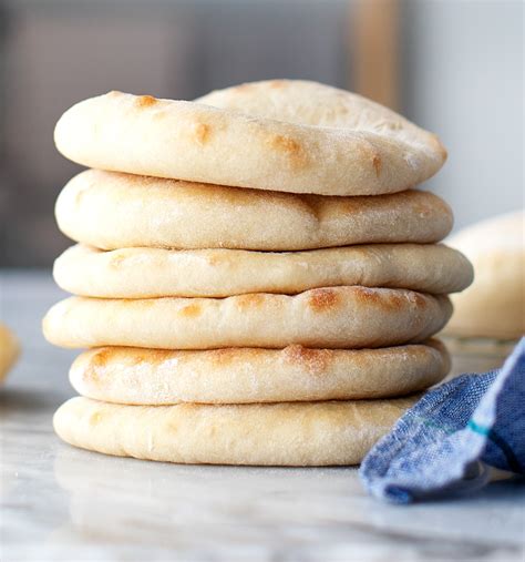 Remove the hot tray from the oven, dust with flour and place the pitta breads on it. Pitta Bread Recipe - Homemade Pita Bread The Best Recipe With Important Tips / 5 out of 5.58 ...