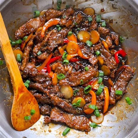 Tender beef and fresh green onions in an amazing garlic and ginger asian sauce, served over hot cooked rice. Mongolian Beef - a quick & easy recipe for a take out ...