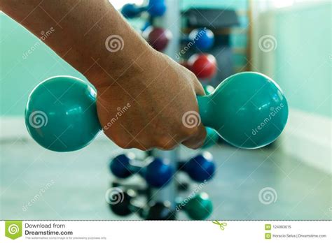 Man Exercising With Weights In The Gym Stock Image Image Of Bicep