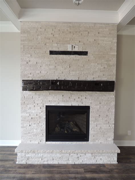 20 White Stone Fireplace With Wood Mantel