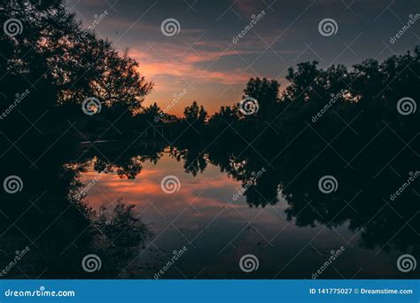 Sunset Over A Quiet Lake Stock Image Image Of Quiet 141775027