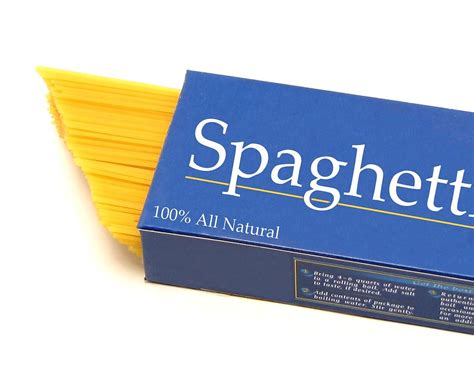 Spaghetti | Free Stock Photo | A box of raw spaghetti isolated on a white background | # 11261