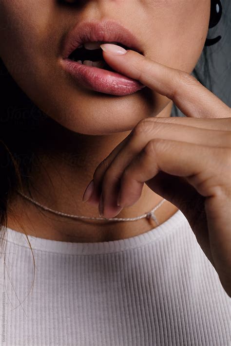 Close Up Of Girl With Finger On Lips By Stocksy Contributor Danil