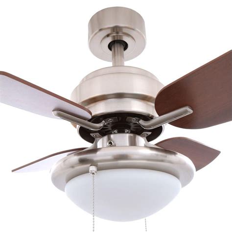 It has five reversible white/honey blades which adds decor style to your room. Hampton Bay Metarie 24 in. Indoor Brushed Nickel Ceiling ...