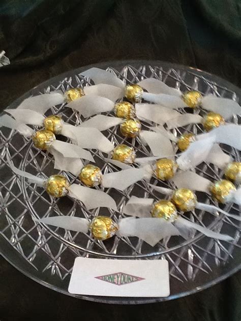 Dark chocolate, milk chocolate, white chocolate Golden Snitches; white chocolate truffles wrapped in gold ...