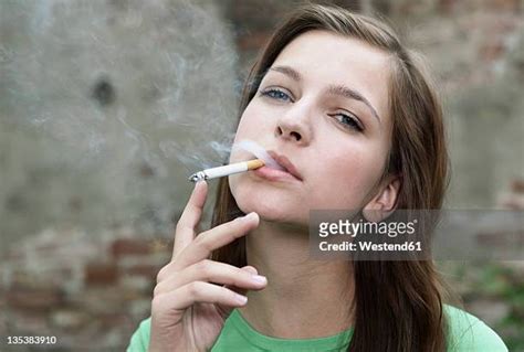 Beautiful Women Smoking Cigarettes Photos And Premium High Res Pictures