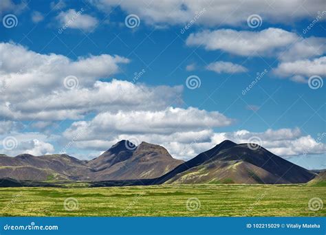 Beautiful Icelandic Landscape With Volcano Mountains Sky And Clouds