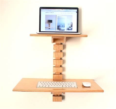 What if i picked up an old adjustable height office chair and converted it somehow? Wall-Mounted Standing Desk | Wall mounted desk, Diy ...