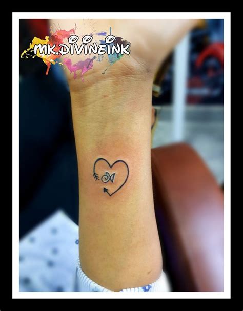 Love hearts tattoo on wrist. Heart tattoo, Name Initial tattoo, Initial tattoo, Cute ...
