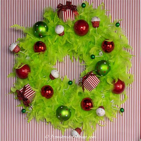 You can add a mixture of red and green glitter to bring in the christmas feel. DIY Grinch Wreath (An Easy Grinch Christmas Door Decoration)