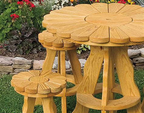 Black japan stain on treated pine. 36" Treated Pine Sunflower Table w/4-Pub Stools