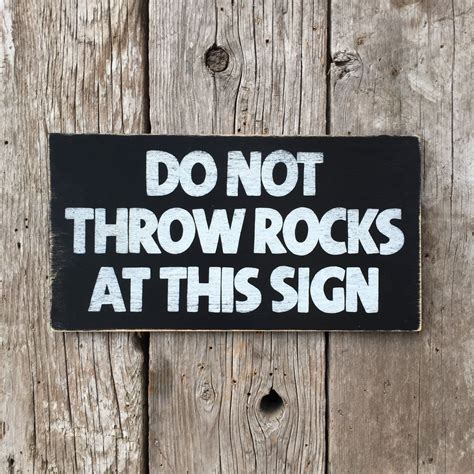 So children and adults wont always throw rubbish on the floor. Do Not Throw Rocks At This Sign Sign | Handmade Vintage ...