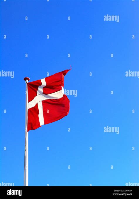 The Danish Flag Dannebrog Waving In The Wind Stock Photo Alamy