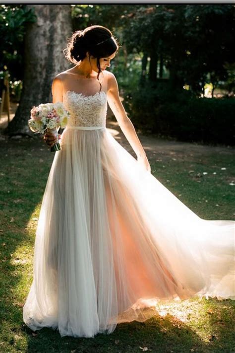 The dress has a bateau neckline in the front and a slightly lowered scoop back. Lace Wedding Dresses, Simple Wedding Dresses, Cheap ...