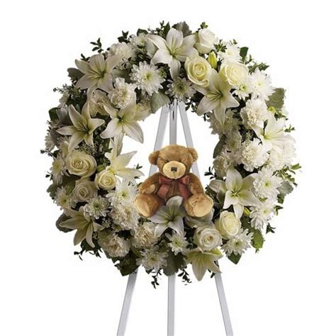 We deliver internationally and work with a network of expert international florists, so we can ensure that your chosen flowers and wreaths will arrive where you want when you want. Baby Boy Funeral Flowers Wreath at Send Flowers | Funeral ...