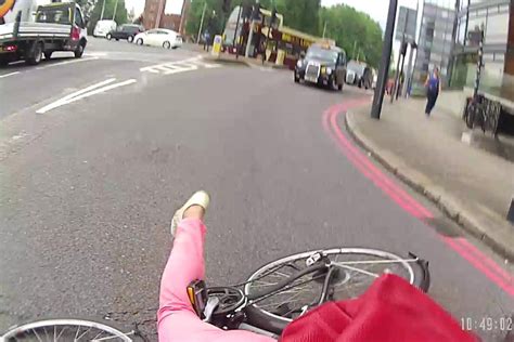 Helmet Cam Captures Moment Cyclist Is Knocked Off Her Bike By Van