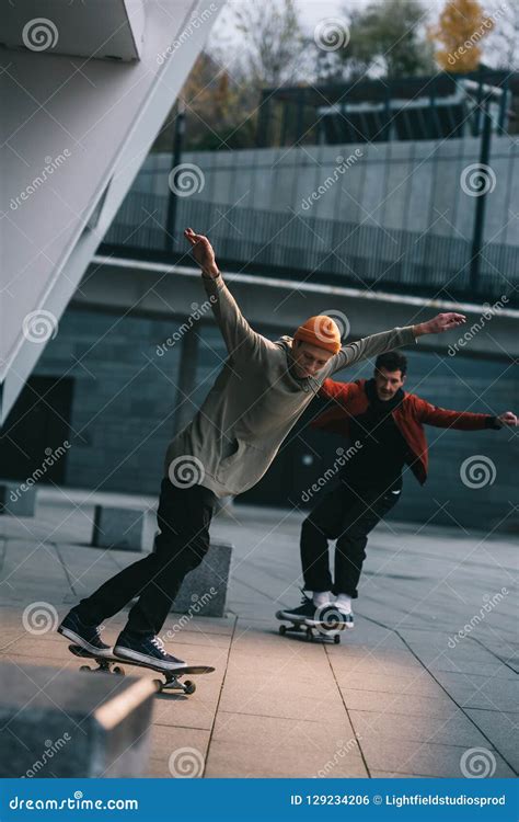 Young Men Riding Skateboards Stock Photo Image Of Skateboards Active