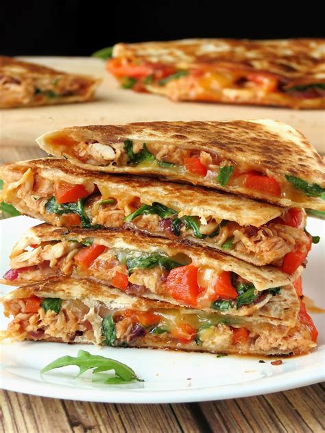 Then build the quesadillas by laying grated cheese on the bottom tortilla, and then arranging the chicken and cooked peppers. Easy Chicken Quesadillas | Recipe | Mexican food recipes ...