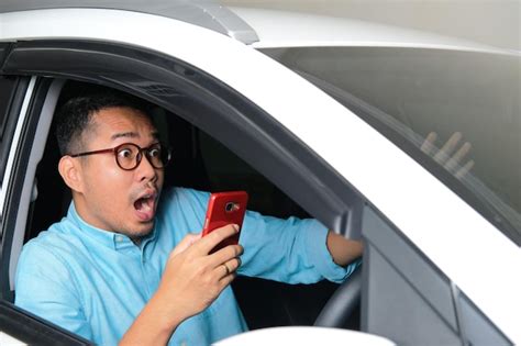 Premium Photo Adult Asian Man Screaming Scared Before Got Accident While Using Handphone When