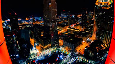 Download Wallpaper 1366x768 Night City Buildings Aerial View Lights